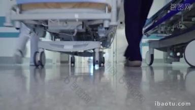 手术床上医院走廊的病人运输 